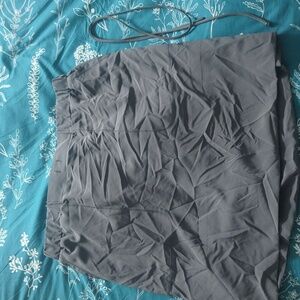 woman's gray athletic skirt